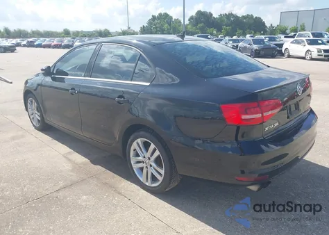 2015 Volkswagen Jetta 1.8T Sel z USA, uszkodzony, nr VIN 3VWL07AJ5FM269322